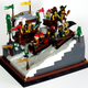 Illustration for article titled Check out this medieval Lego bobsled team